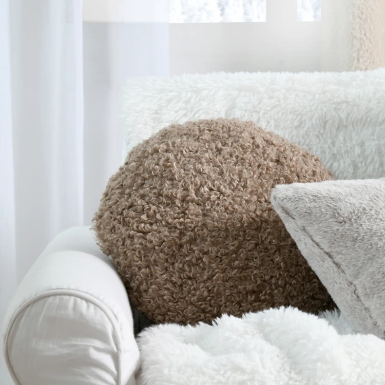 Coussin rond bouclette doudou