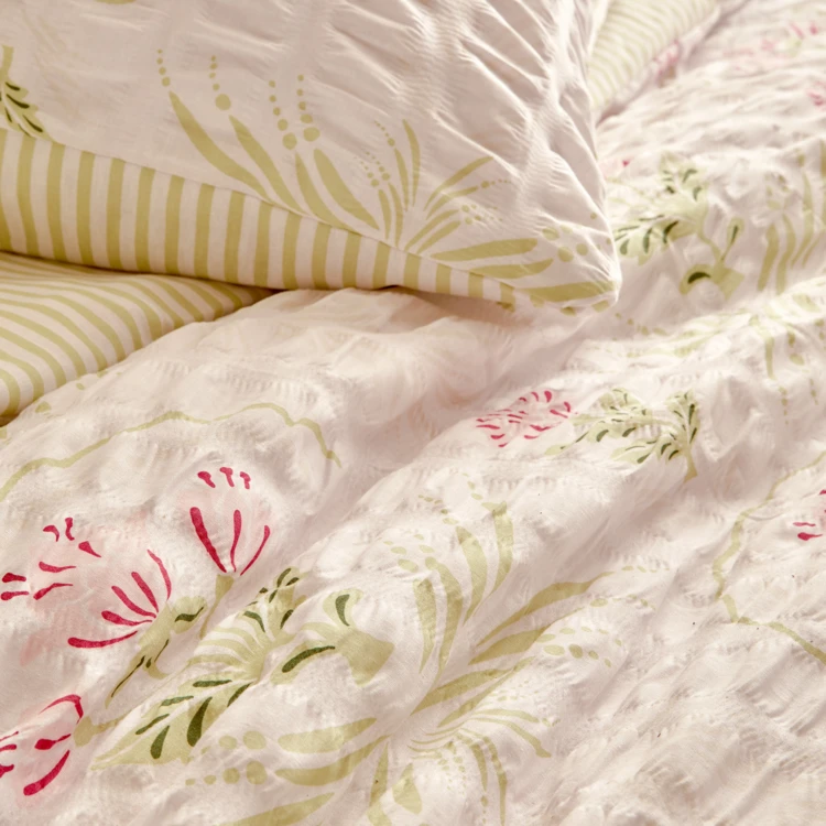Parure de lit réversible texturée 3 pièces florale housse + taies