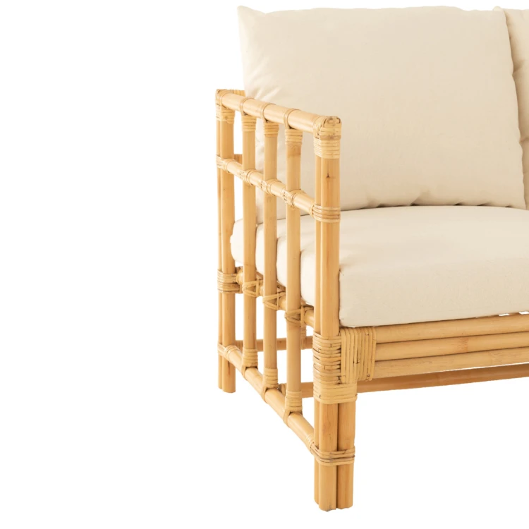 Divano a due posti in rattan con cuscini