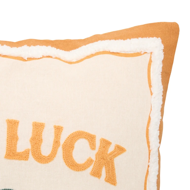 Coussin décoratif en coton brodé GOOD LUCK