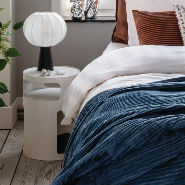 Table d’appoint ronde avec niches de rangement