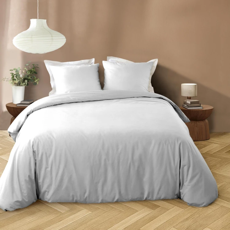 Parure de lit 3 pièces en microfibre unie lavée housse + taies