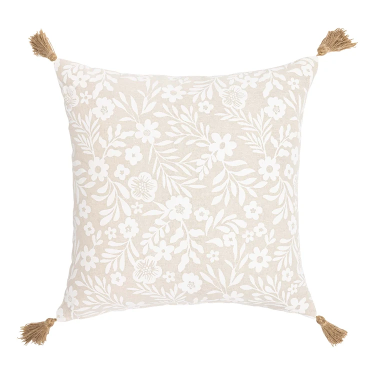 Almofada em polycotton com estampado floral e borlas