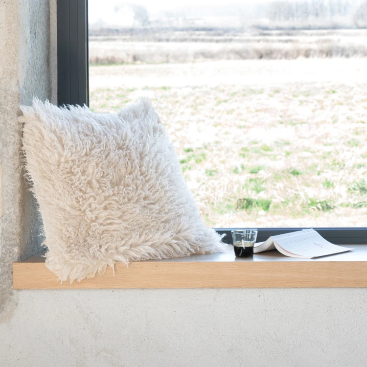 Coussin à poil long ultra doux