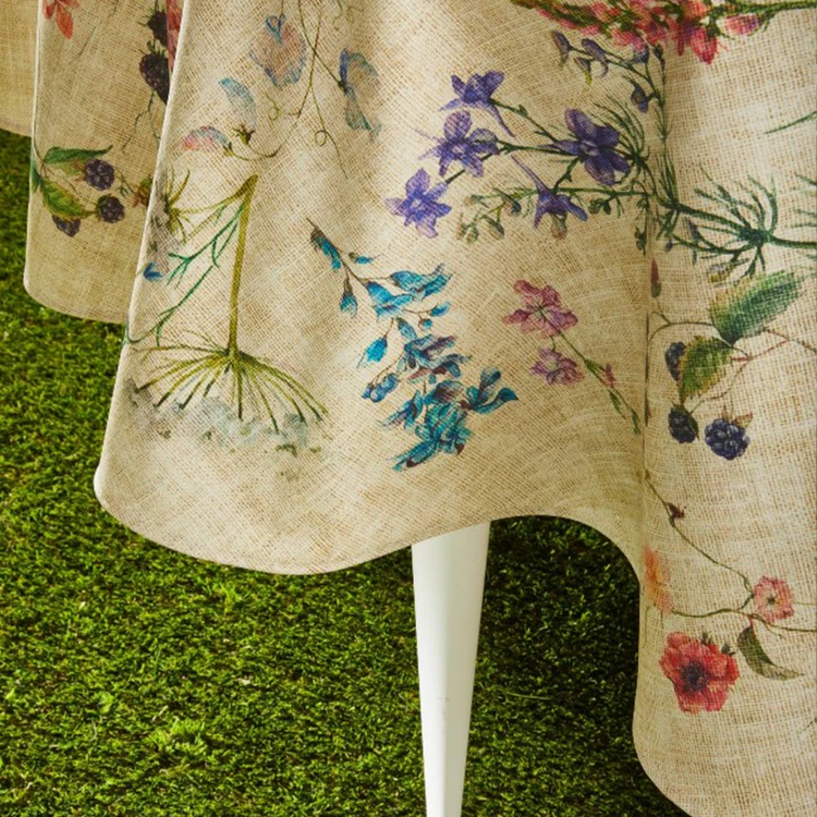 Mantel redondo de algodón con revestimiento antimanchas y estampado de flores