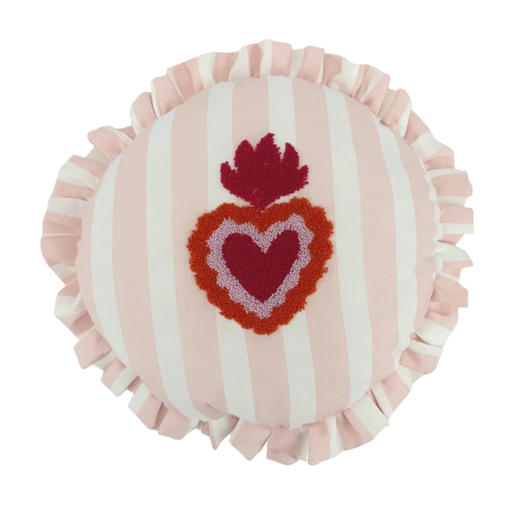 Coussin rond à rayures avec motif cœur brodé