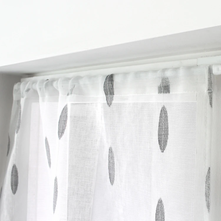 Par de visillos pequeños de jacquard con diseño ovalado