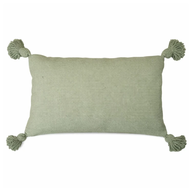 Housse de coussin en laine à pompons