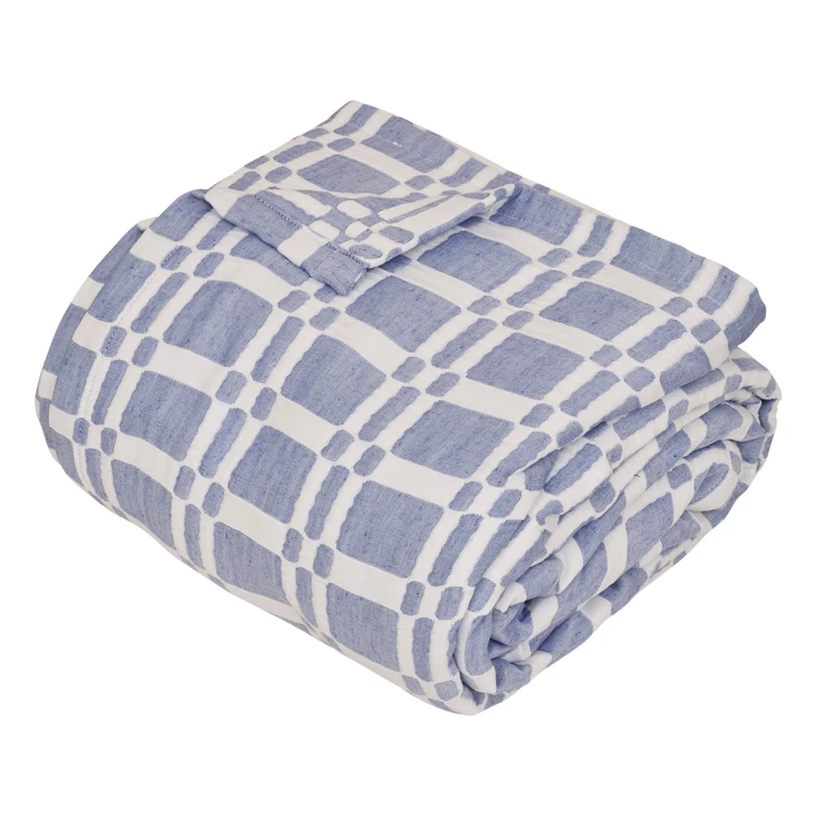 Colcha acolchada con estampado geométrico