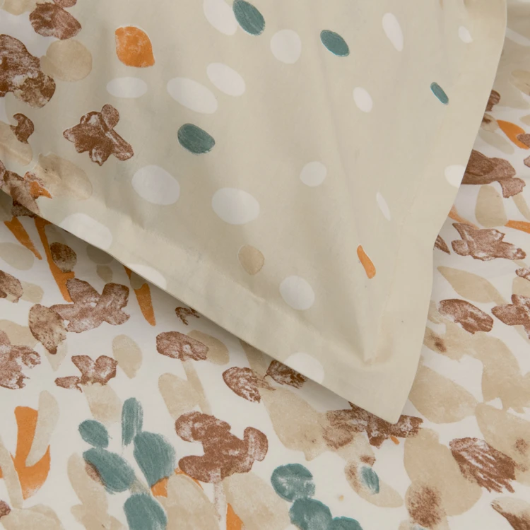 Set da letto in cotone con motivo floreale stilizzato e federe