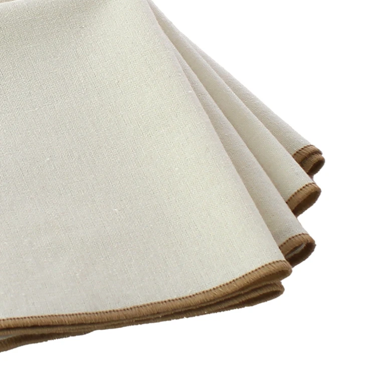 Serviette de table unie et bourdonnée