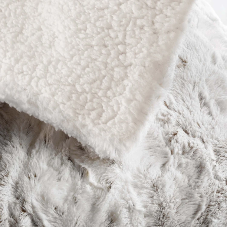 Plaid doublé en imitation fourrure