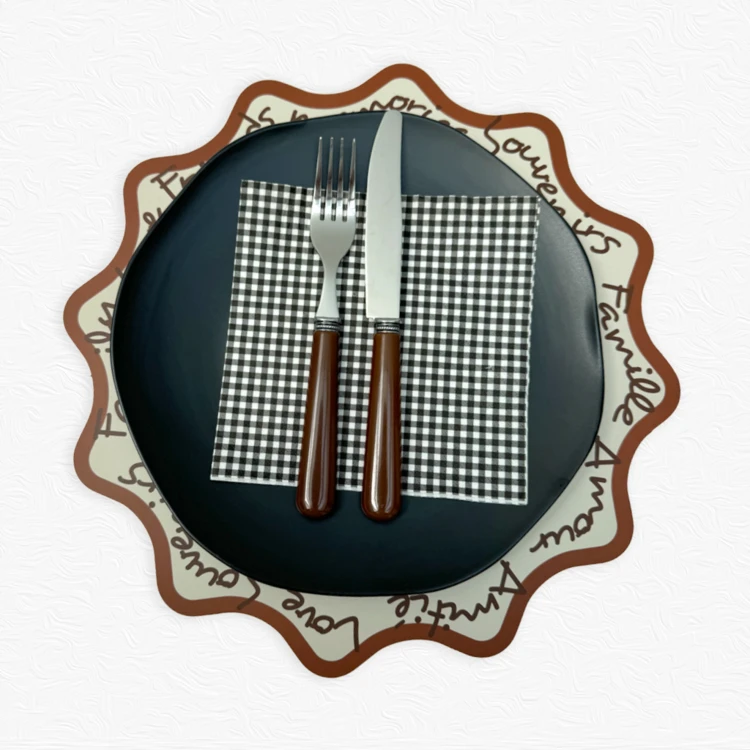 Set de table rond rigide avec écriture décorative