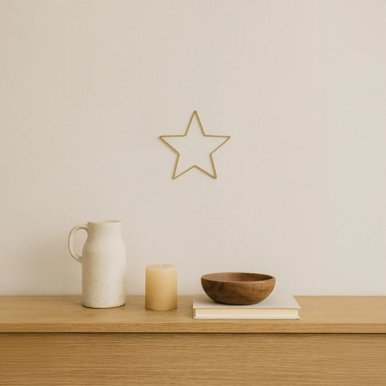 Déco murale étoile fil laiton torsadé