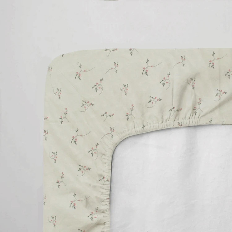 Drap-housse bébé en jersey 100% coton extensible fleurs