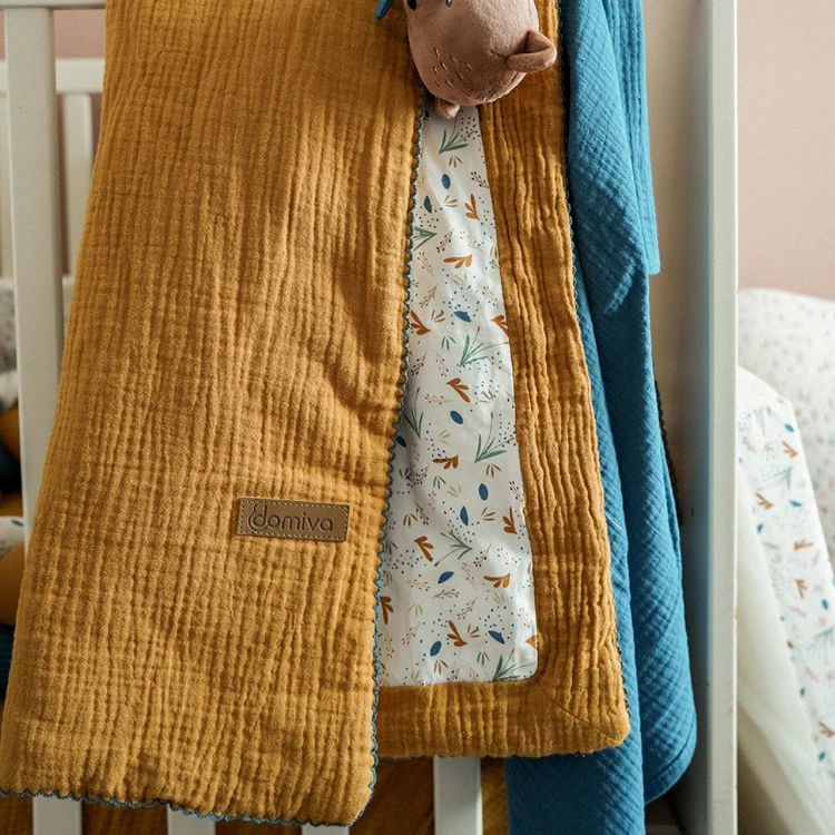 Couverture réversible pour bébé en double gaze de coton et jersey
