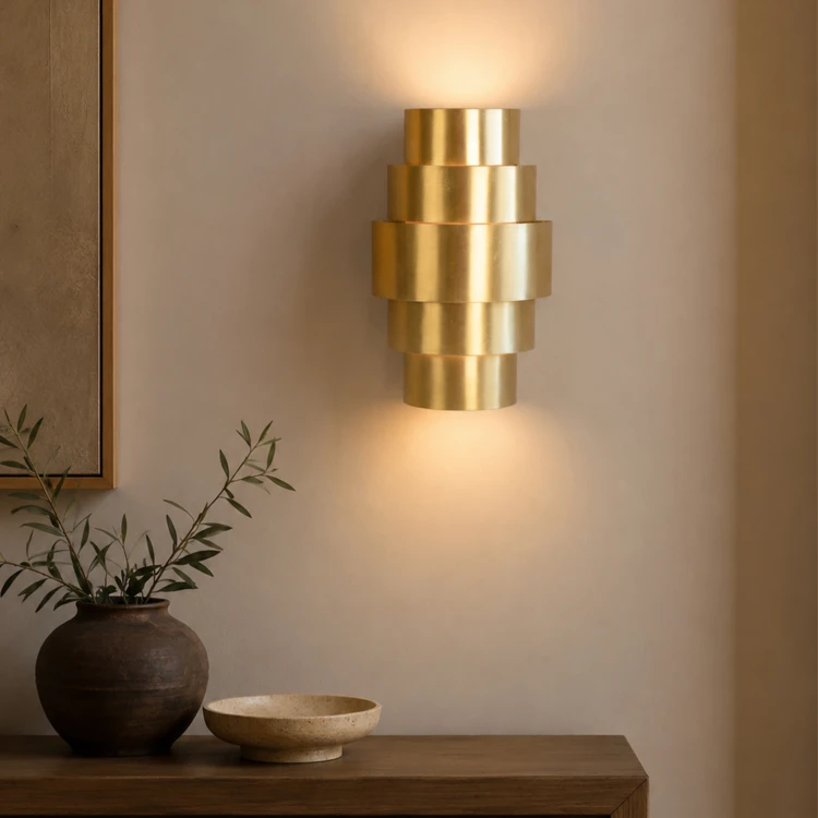 Afgeronde wandlamp van messing