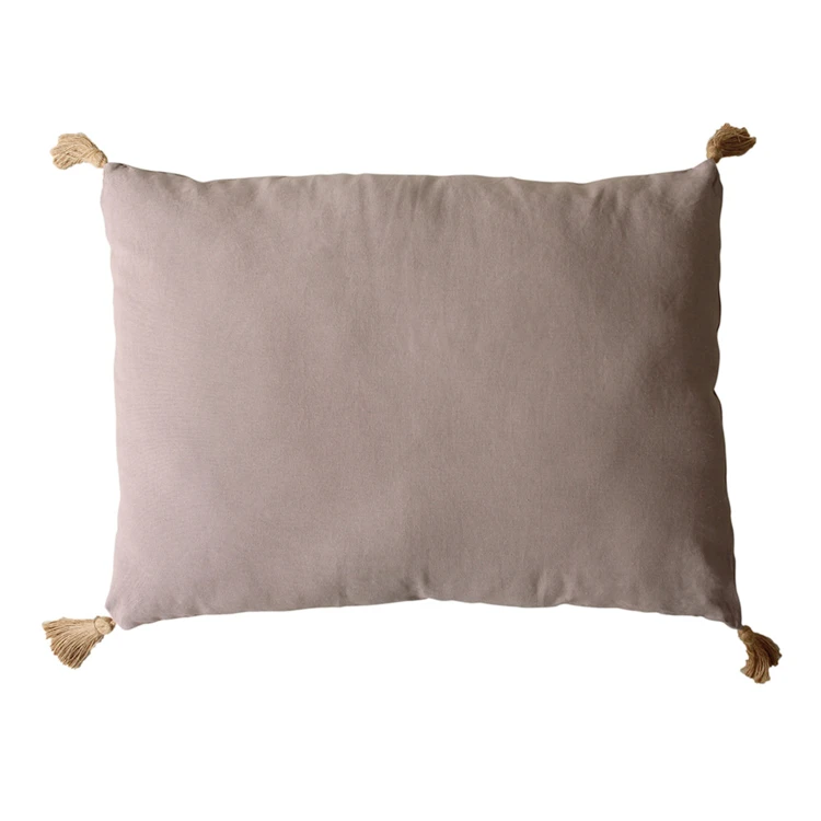 Coussin avec pompons en jute
