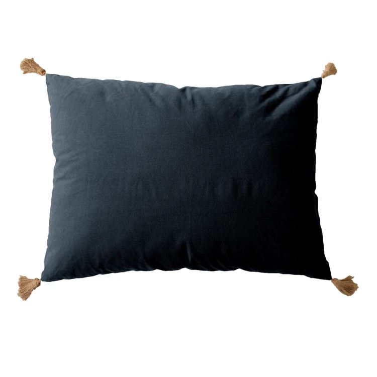 Coussin avec pompons en jute