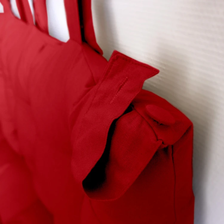 Cuscino per testiera in cotone con linguette a bottone
