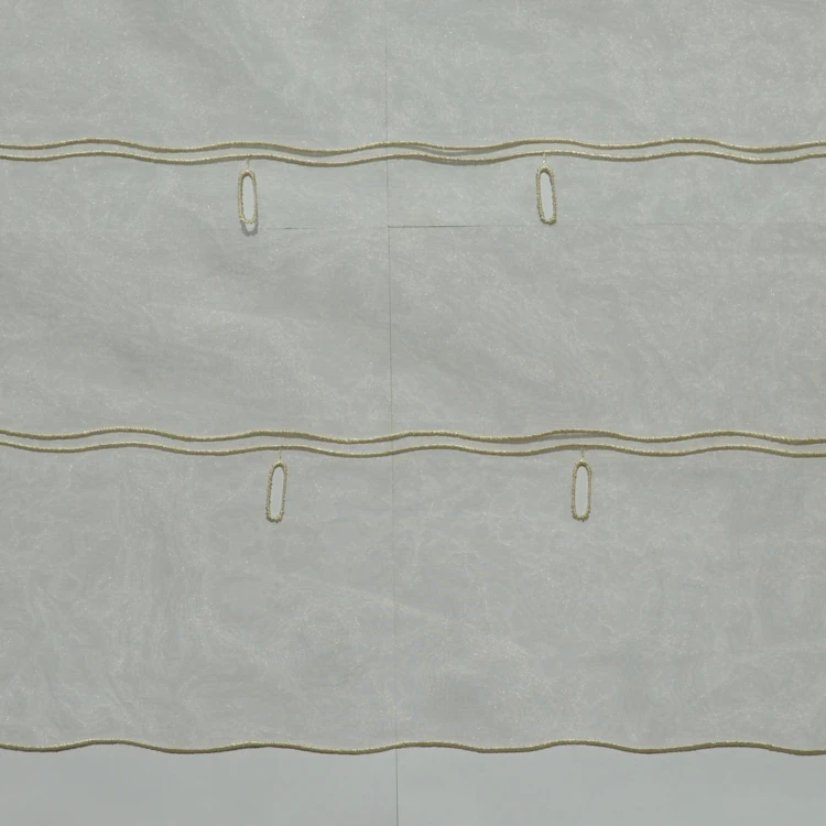 Modulable organza uni à boutonnières brodées