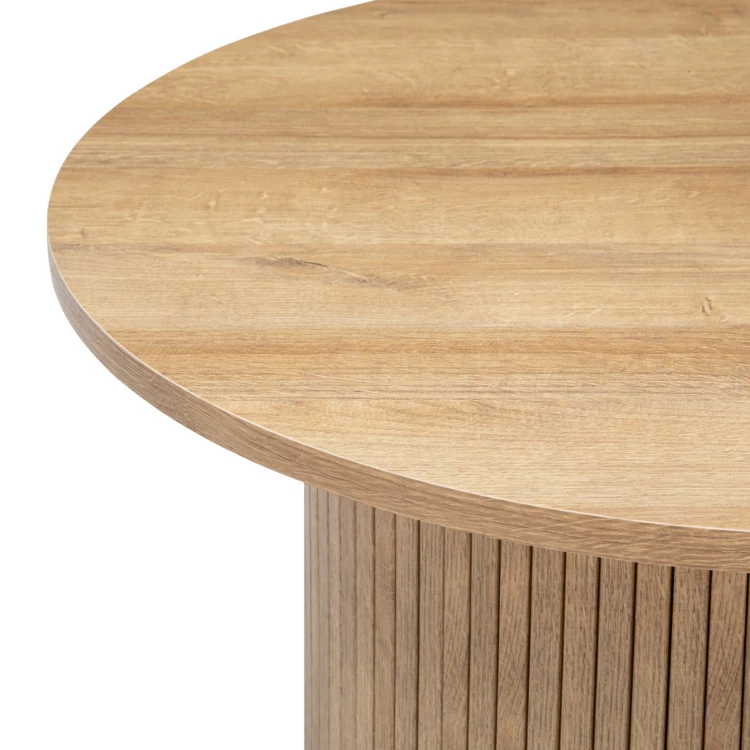 Table basse ronde avec piètement cannelé