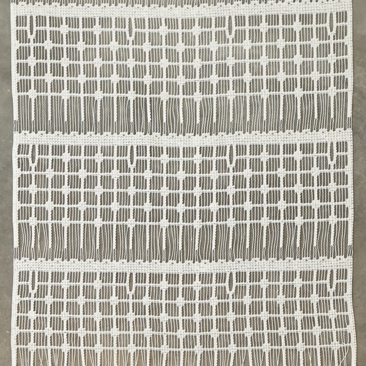 Modulable brodé à carreaux