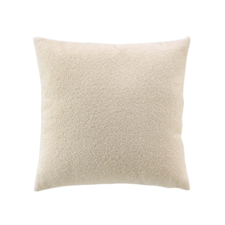 Coussin déhoussable en bouclette unie
