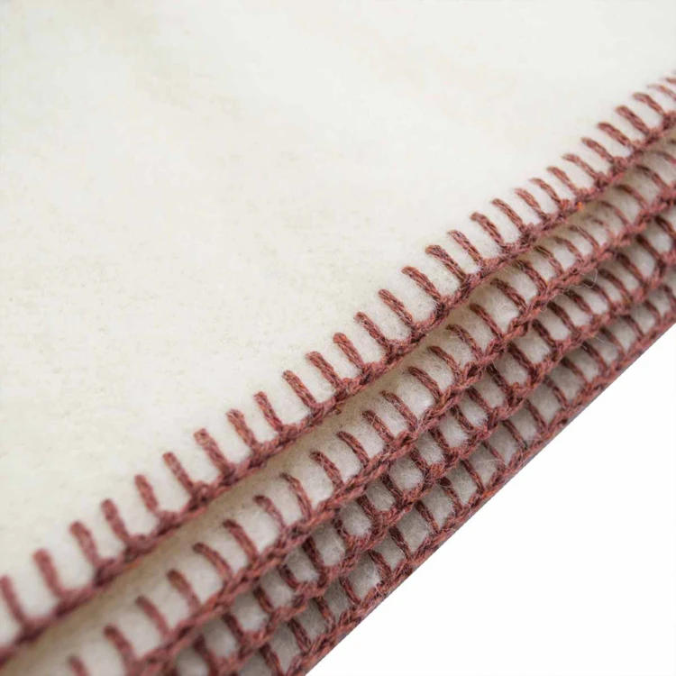 Couverture pure laine vierge naturelle finition point de cheval