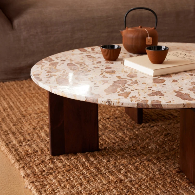 Table basse ronde en pierre effet marbre