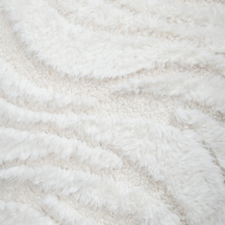 Coussin imitation fourrure vagues