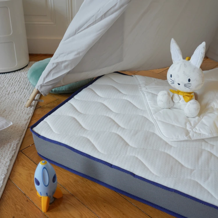 Matelas bébé face été / face hiver avec garnissage laine et soutien ferme déhoussable