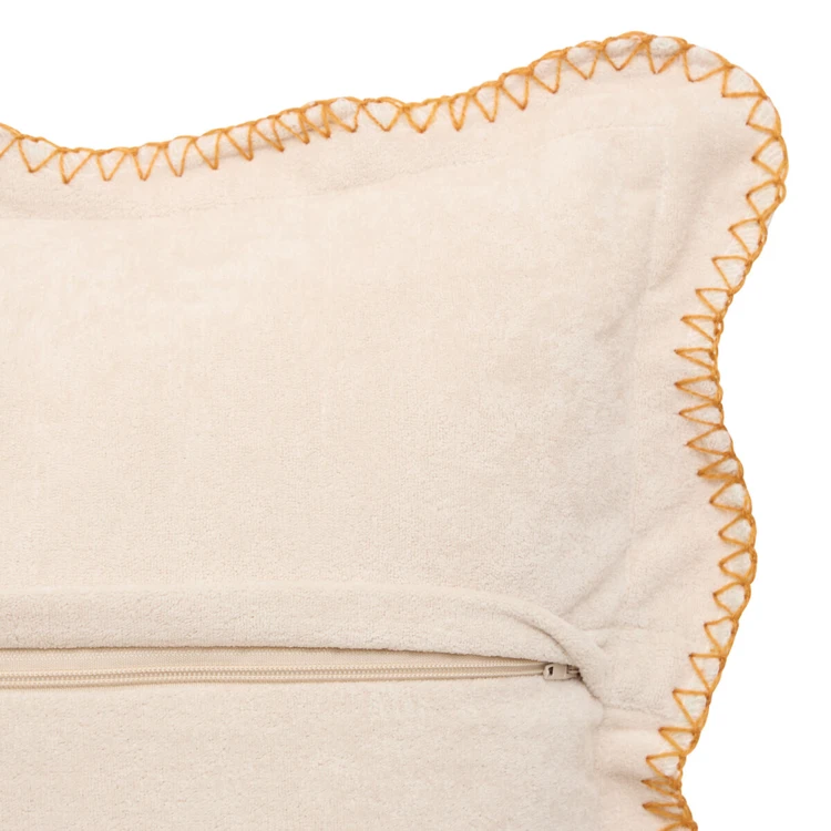 Coussin décoratif déhoussable à bord ondulé