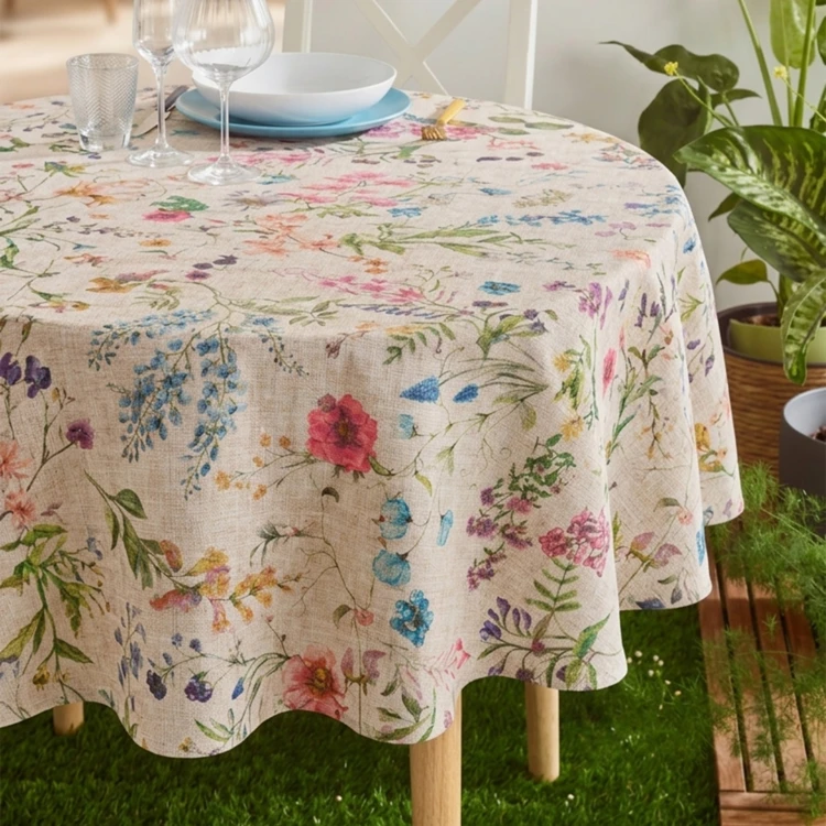 Mantel redondo de algodón con revestimiento antimanchas y estampado de flores