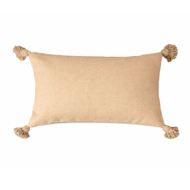 Housse de coussin en laine à pompons