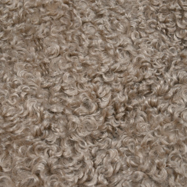 Coussin rond bouclette doudou